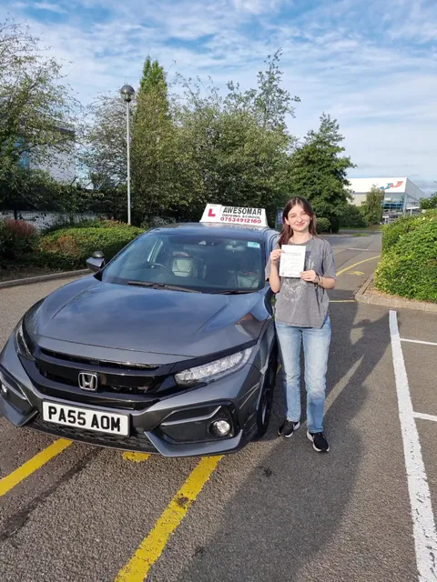 Awesomar Driving School pupil celebrating passing their driving test